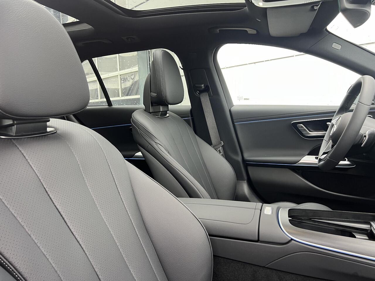 Mercedes-Benz E-estate 300 e Luxury Line | Panoramadak | Trekhaak | Donkergetint Glas Achter | 360° Camera | DISTRONIC Afstandsassistent | Dodehoekassistent | Elektrisch Verstelbare Stoelen + Memory | Stoelverwarming | Apple CarPlay | Android Auto