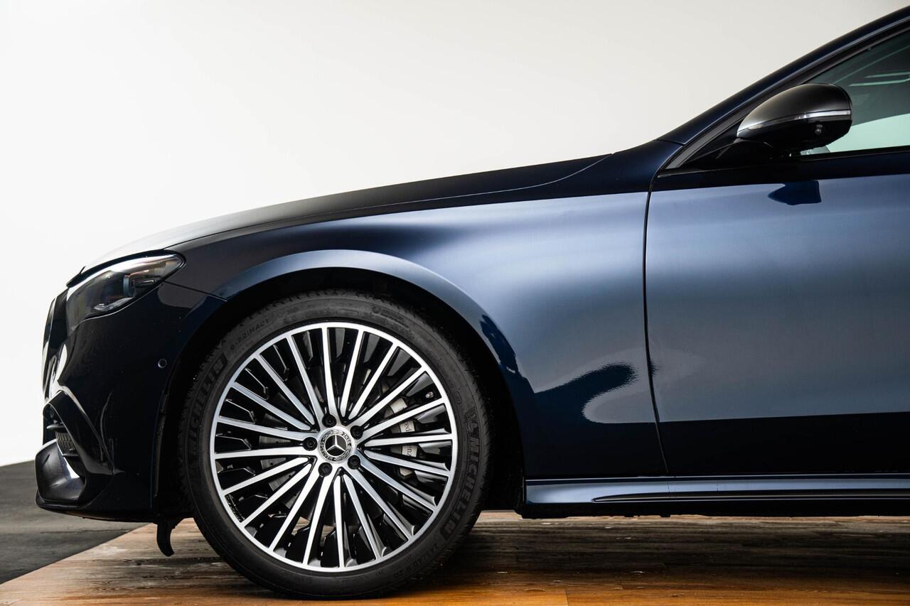 Mercedes-Benz E-estate 300 e AMG Line Trekhaak - Panoramadak - Rijassistentiepakket Plus - Night Pack - Memory Pakket - Burmester® - Airmatic - Comfort stoelen - Stoelverwarming voor - Warmtewerend/donkergetint glas -