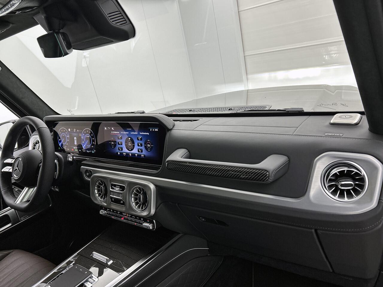 Mercedes-Benz G-KLASSE 580 met EQ-Technologie 116 kWh | AMG Line | SUPERIOR Line interieur | Warmtecomfortpakket | AMG sierelementen in carbon | Comfortpakket | Nightpakket | Treeplanken | MANUFAKTUR Schöckl designpakket |