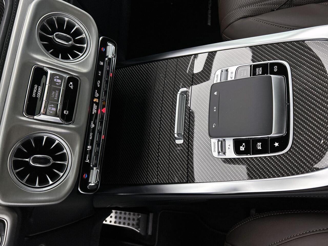 Mercedes-Benz G-KLASSE 580 met EQ-Technologie 116 kWh | AMG Line | SUPERIOR Line interieur | Warmtecomfortpakket | AMG sierelementen in carbon | Comfortpakket | Nightpakket | Treeplanken | MANUFAKTUR Schöckl designpakket |