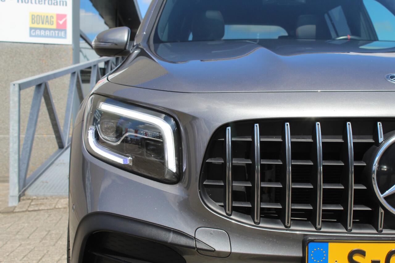 Mercedes-Benz GLB-Klasse AMG 35 4MATIC Premium Plus Panoramadak/Night pakket/Sfeerverlichting/Navigatie/Keyless/Cruise control/Climate control/Elektrisch verstelbare stoelen met memory/Stoelverwarming/Dodehoek detectie/Achteruitrijcamera/Parkeersensoren rondom/Elektrische achterk