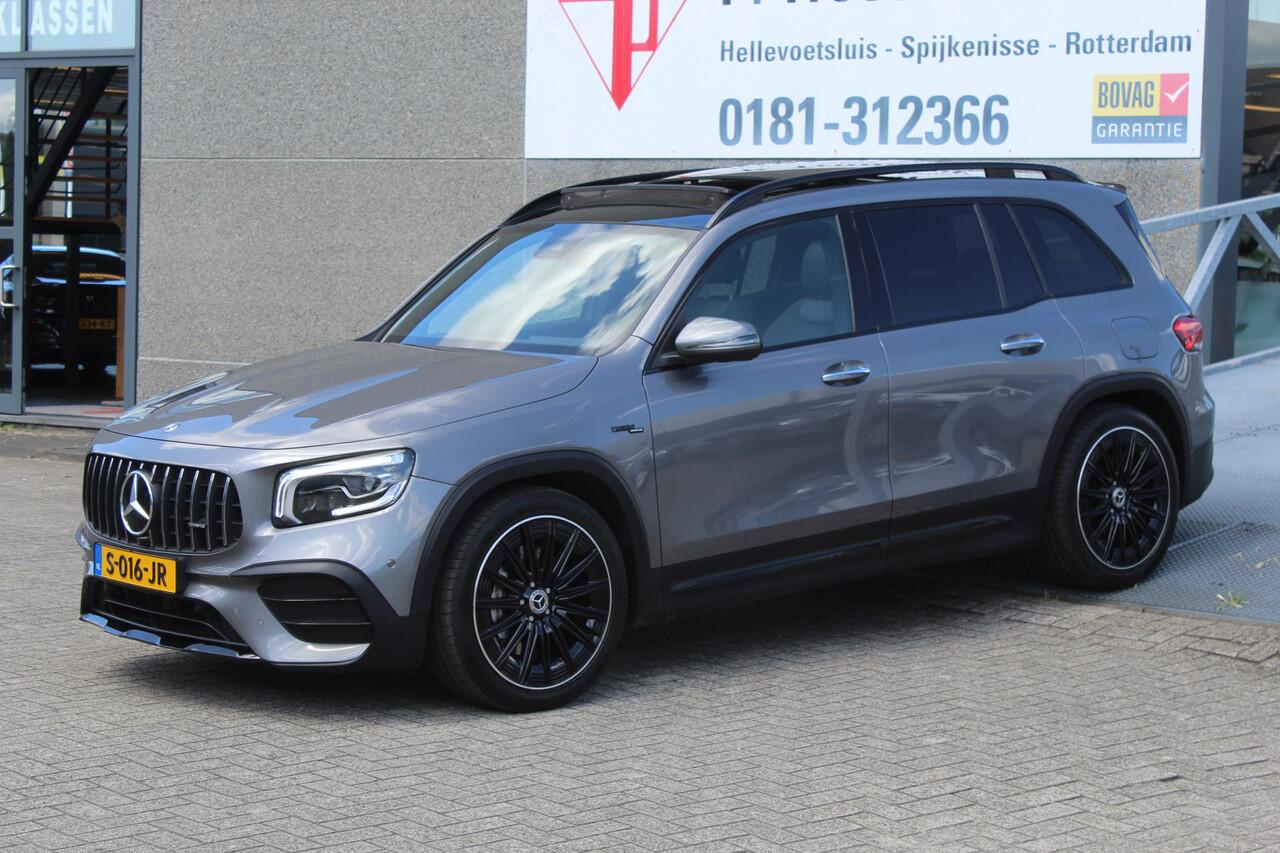 Mercedes-Benz GLB-Klasse AMG 35 4MATIC Panoramadak/Night pakket/Sfeerverlichting/Navigatie/Keyless/Cruise control/Climate control/Elektrisch verstelbare stoelen met memory/Stoelverwarming/Dodehoek detectie/Achteruitrijcamera/Parkeersensoren rondom/Elektrische achterk