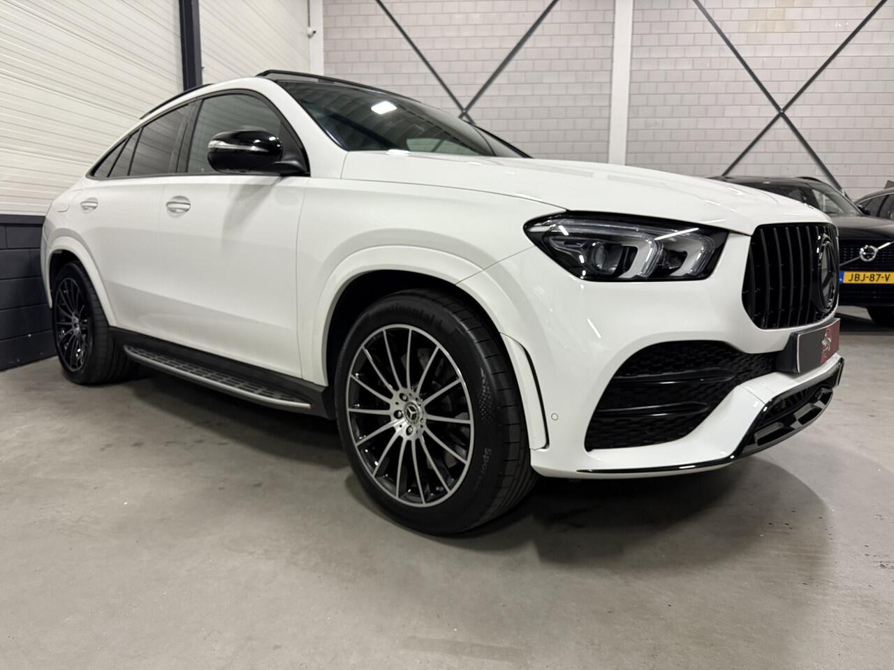 Mercedes-Benz GLE-KLASSE Coupé 350 e 4MATIC AMG PANO/BURMESTER/21"BREEDSET/360CAMERA/WIDESCREEN/KEYLESS/PRIVACY/PANAMERICANA-GRILLE/53AMG DIFFUSER+UITLATEN/UNIEKE AUTO DIE IN ABSOLUTE NIEUWSTAAT VERKEERT
