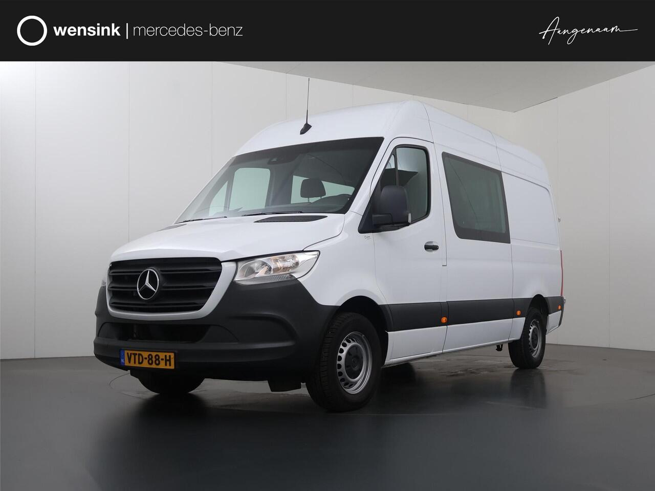 Mercedes-Benz SPRINTER 315 CDI | L2 H2 | RWD | Aut. | DUBBEL CABINE | NL AUTO | DEALER ONDERHOUDEN | 6-ZITS | 2800KG TREKHAAK | GROOT NAVIGATIE 10.25" | CAMERA | CRUISE | AIRCO | BETIMMERDE LAADRUIMTE | CARPLAY | ANDROID AUTO