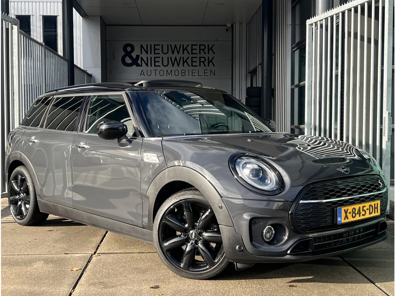 Mini COOPER CLUBMAN Mini 2.0 S Chili | AUTOMAAT | LEDER | SCHUIF/KANTELDAK | CARPLAY/ANDROID | HARMAN/KARDON | NAVI | CRUISE CONTROL | PDC V+A | CLIMATE CONTROL | LMV 18'' | STOELVERWARMING | KEYLESS | LED | BLUETOOTH