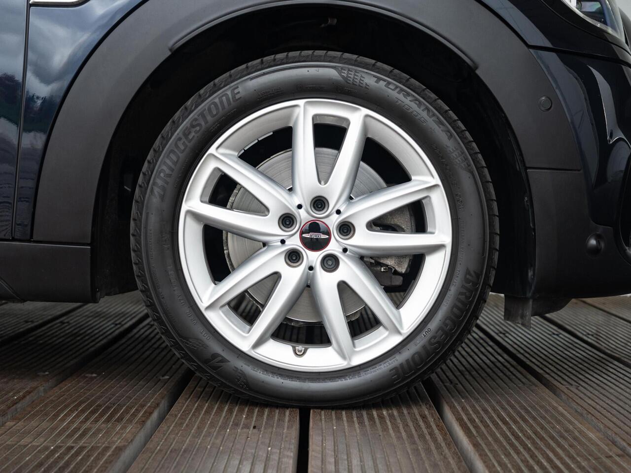 Mini COUNTRYMAN SE ALL4 JCW pakket | Glazen Panoramadak | Elektrisch verstelbare lederen stoelen | Stoel- en voorruitverwarming | Head-Up Display | Harman Kardon | Camera