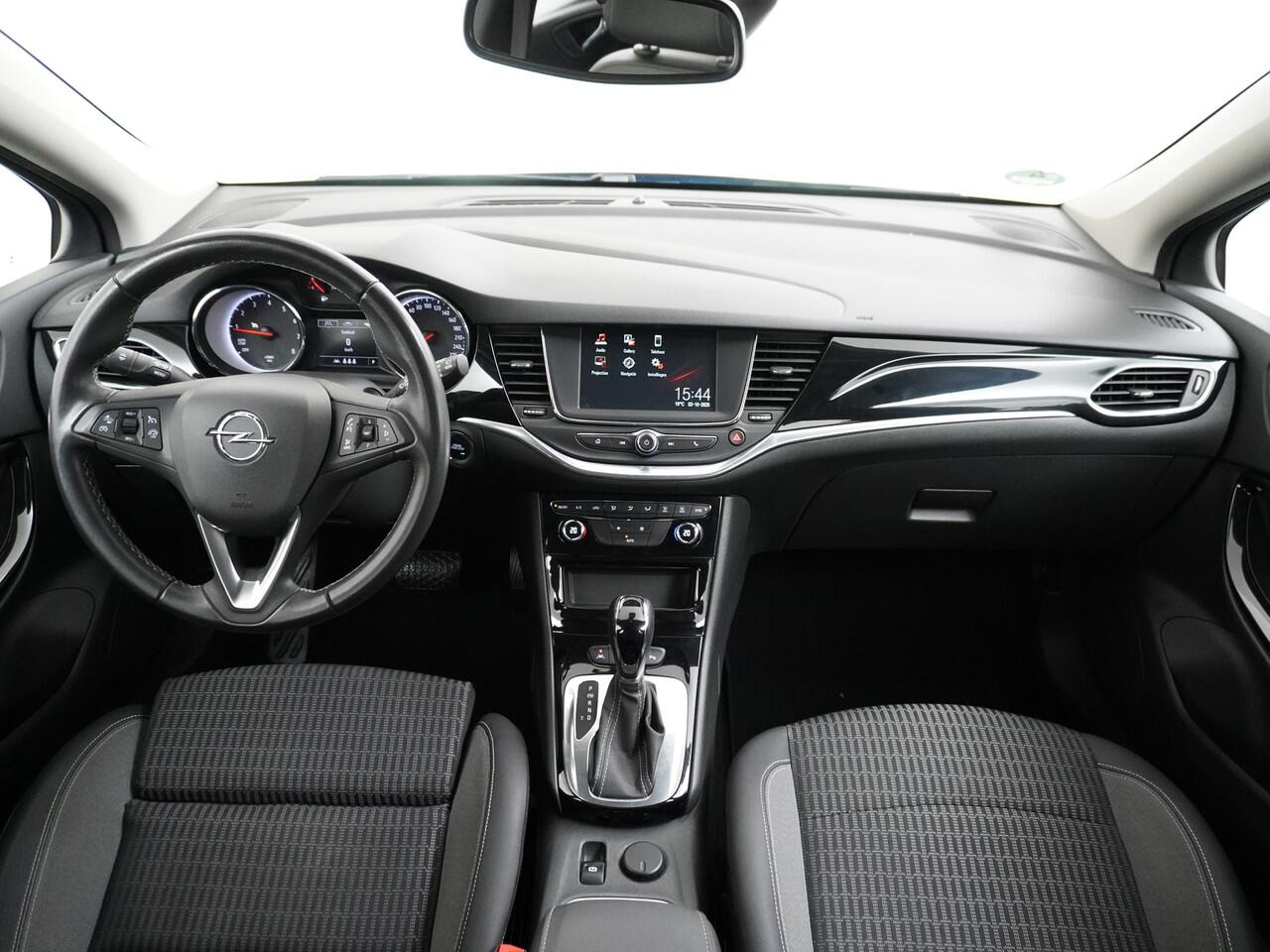Opel ASTRA Sports Tourer 1.4T 145pk Navi Camera Lane-dep. Keyless 1/2Leer CruiseControl Led Bluetooth Pdc Apple/Android Aut.Verlichting Isofix Elek.Ramen Ecc Tel. Usb 16''LM Business Elegance