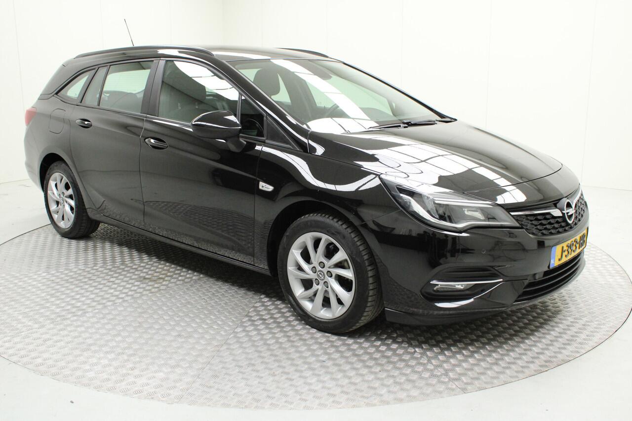 Opel ASTRA Sports Tourer 1.2 Business Edition | trekhaak | climate control | navigatie | carplay | pdc v/a + camera | cruise control | bluetooth