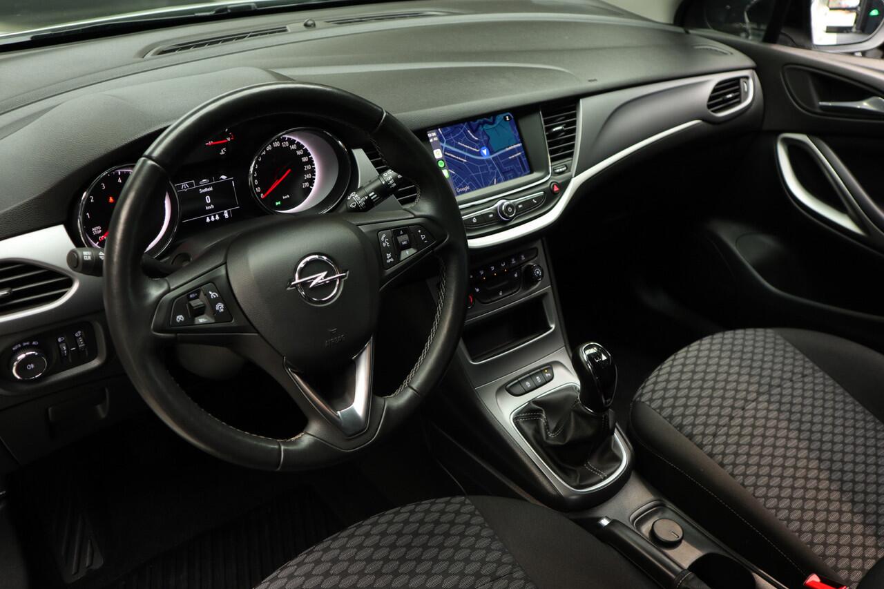 Opel ASTRA 1.2 T Navi Airco Stoel & stuurverwarming Carplay PDC Bluetooth Cruise PDC 6 versnellingen BTW auto