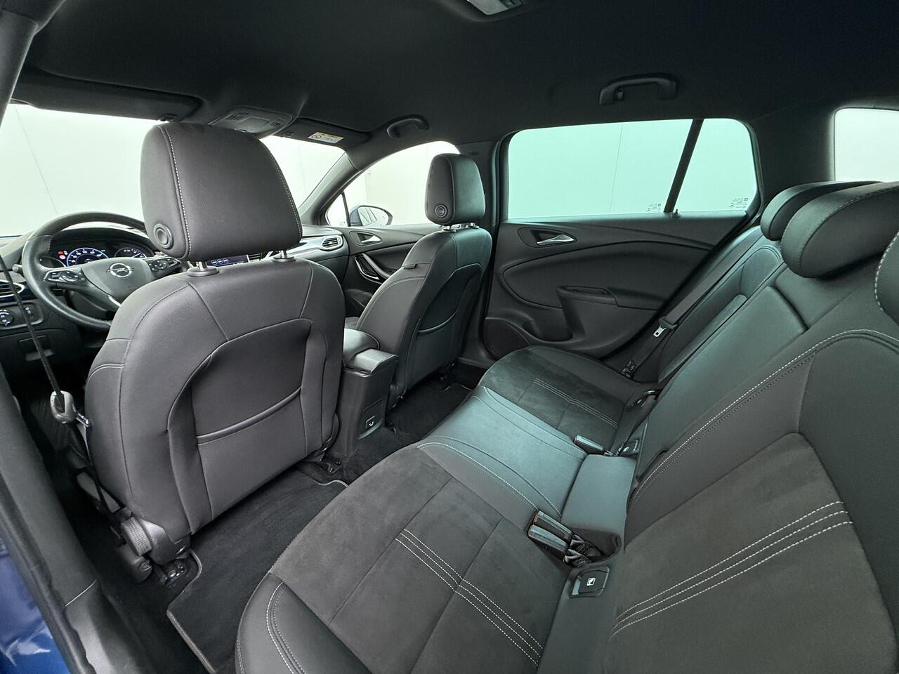 Opel ASTRA Sports Tourer 1.2T Leer/Alcantara Led-Matrix Navi Camera Park-Assist + PDC-a+v Innovation Bose®-Hifi Apple Carplay Android Keyless Dual-Ecc Elegance AGR-Comfort-Stoel+Stuur+Voorruitverwarming Elek.Achterklep Pdc Lane Assist DAB Regen-Lichtsensor Bordherke