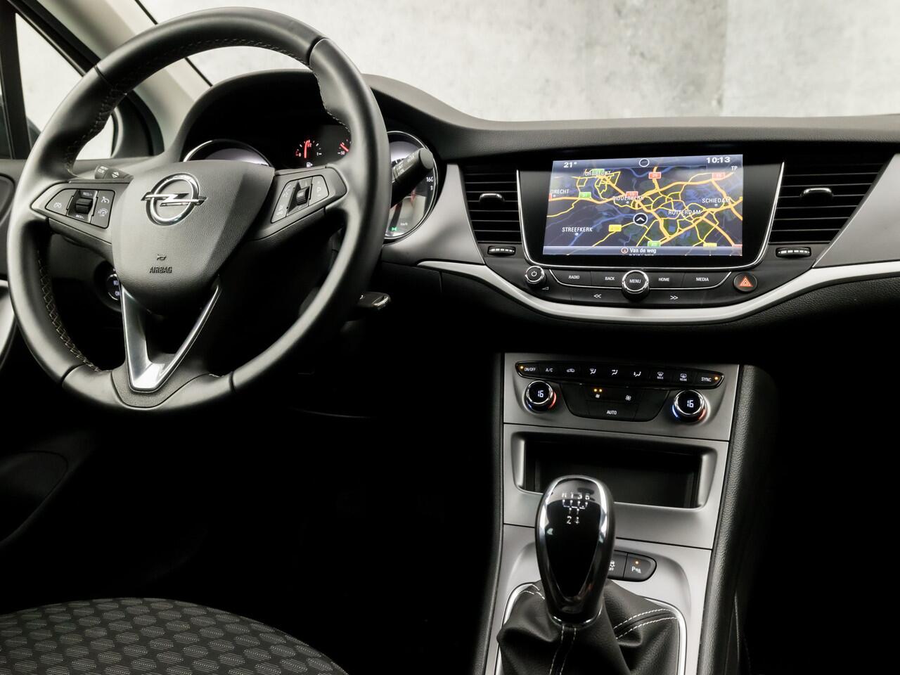 Opel ASTRA Sports Tourer 1.0 Turbo Sport (APPLE CARPLAY, GROOT NAVI, CLIMATE, SPORTSTOELEN, CRUISE, PARKEERSENSOREN, GETINT GLAS, LM VELGEN, NIEUWSTAAT)