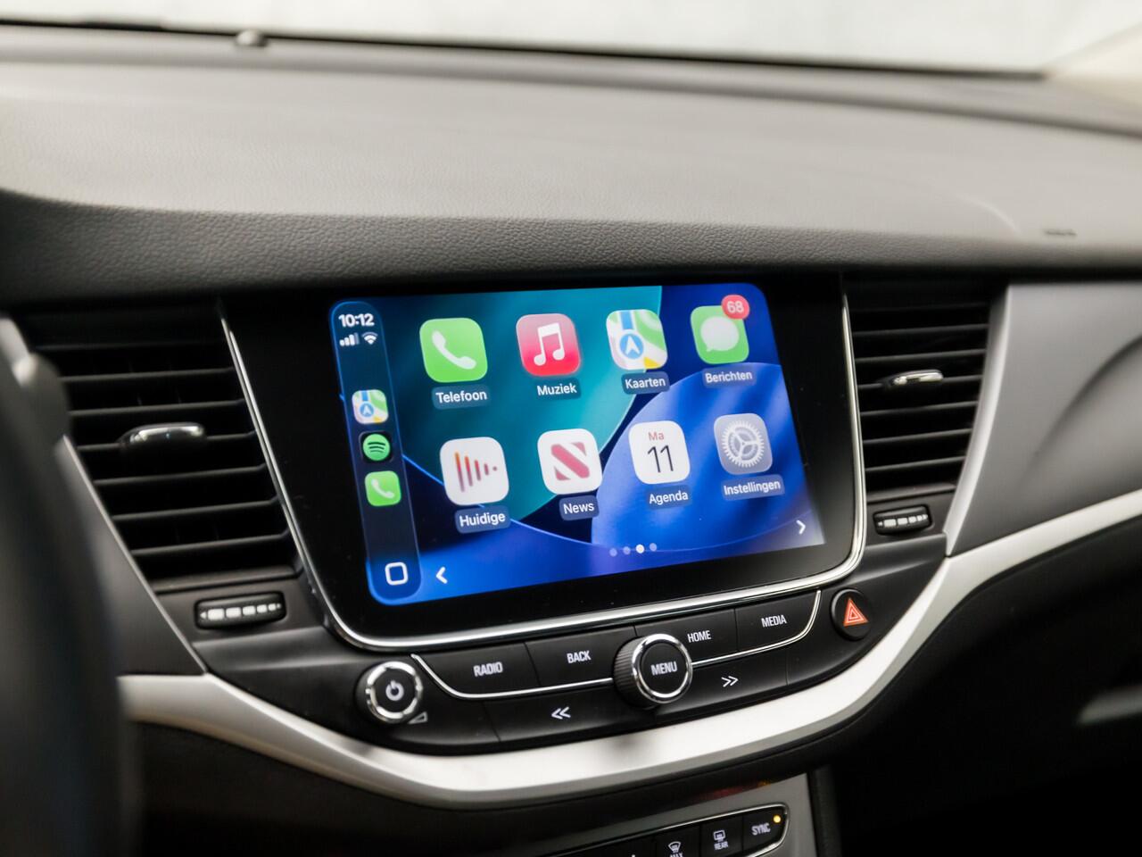 Opel ASTRA Sports Tourer 1.0 Turbo Sport (APPLE CARPLAY, GROOT NAVI, CLIMATE, SPORTSTOELEN, CRUISE, PARKEERSENSOREN, GETINT GLAS, LM VELGEN, NIEUWSTAAT)