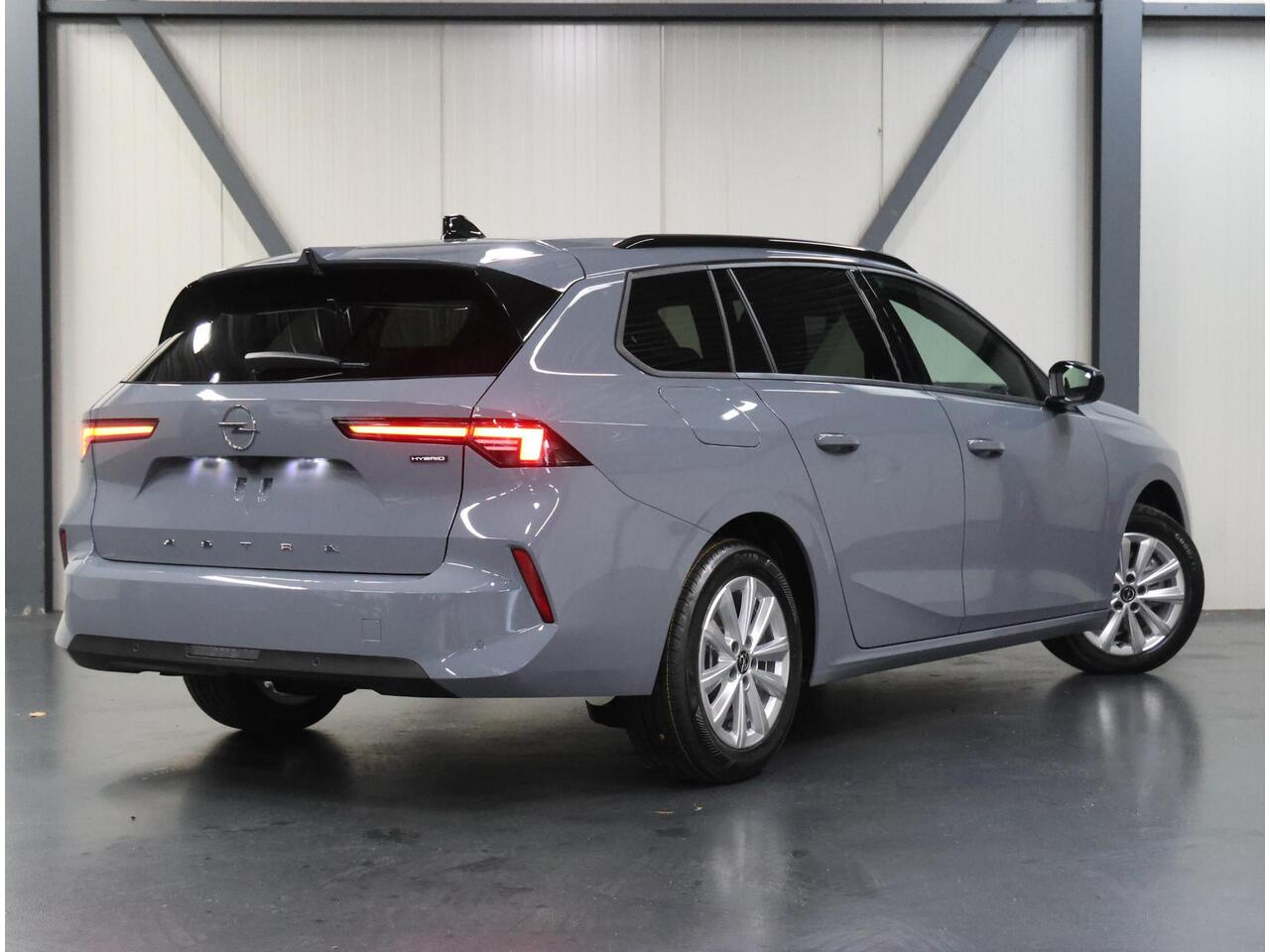 Opel ASTRA Sports Tourer 1.2 Turbo Hybrid Business Edition | AUTOMAAT | AppleCarplay/AndroidAuto | Navigatie | CruiseControl | Camera | Parkeersensoren | AGR Stoel | Stoel/Stuur verwarming |