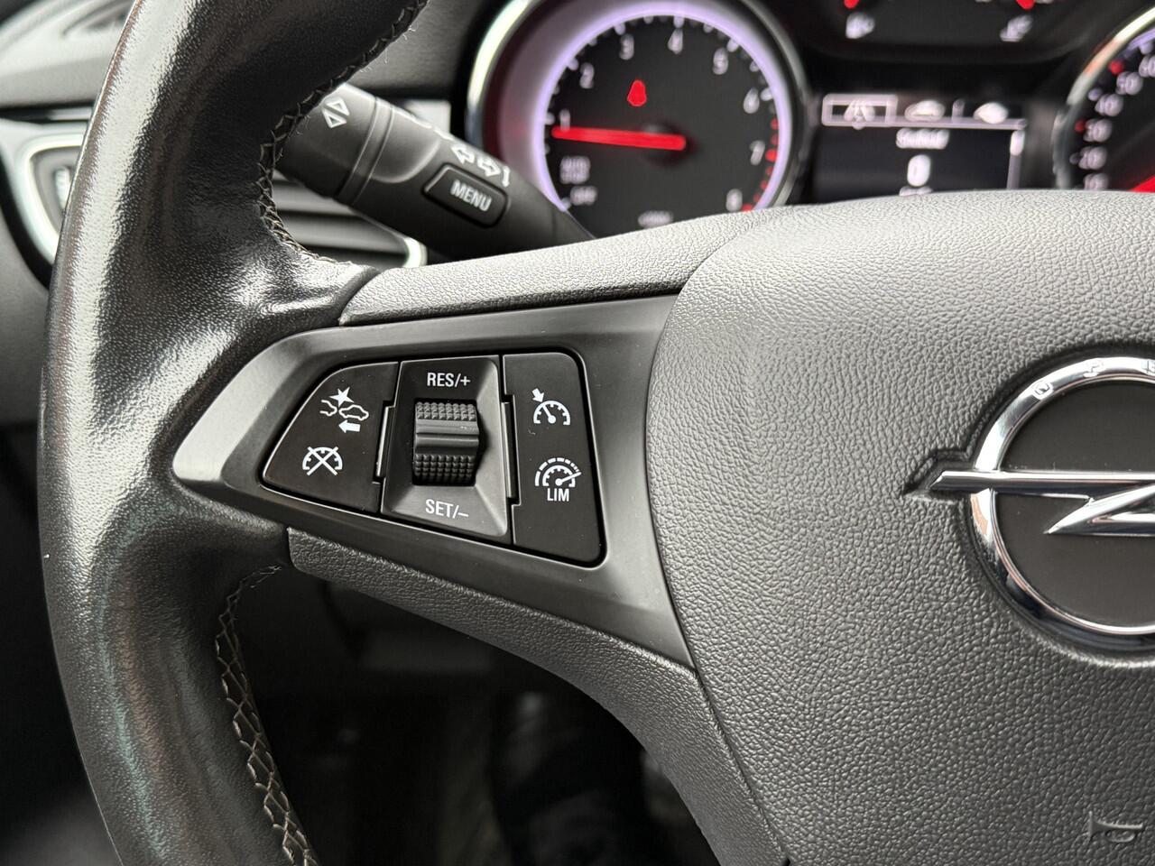 Opel ASTRA Sports Tourer BWJ 2021 1.2 131 PK Business Elegance FULL LED | HALF LEDER | CAMERA | STOELVERW. | STUURVERW. | CARPLAY + ANDROID | NAVI | CLIMA | CRUISE | DAB | LMV | PDC