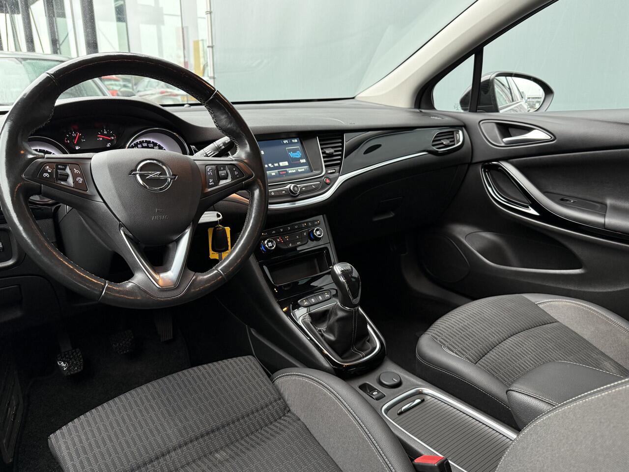 Opel ASTRA Sports Tourer BWJ 2021 1.2 131 PK Business Elegance FULL LED | HALF LEDER | CAMERA | STOELVERW. | STUURVERW. | CARPLAY + ANDROID | NAVI | CLIMA | CRUISE | DAB | LMV | PDC