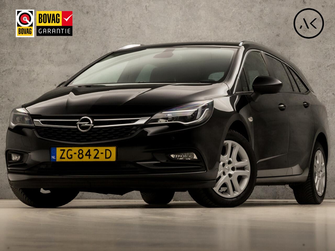 Opel ASTRA Sports Tourer 1.0 Turbo Sport (APPLE CARPLAY, GROOT NAVI, CLIMATE, SPORTSTOELEN, CRUISE, PARKEERSENSOREN, GETINT GLAS, LM VELGEN, NIEUWSTAAT)