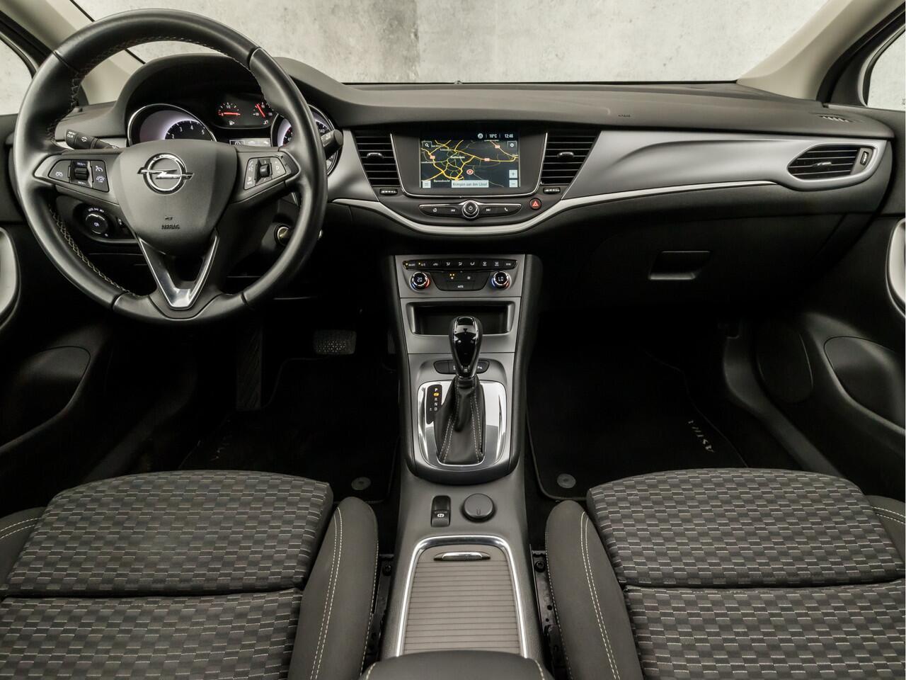 Opel ASTRA 1.4 Turbo Sport 150Pk Automaat (APPLE CARPLAY, GROOT NAVI, CLIMATE, LM VELGEN, SPORTSTOELEN, TREKHAAK, PARKEERSENSOREN, NIEUWE APK, NIEUWSTAAT)