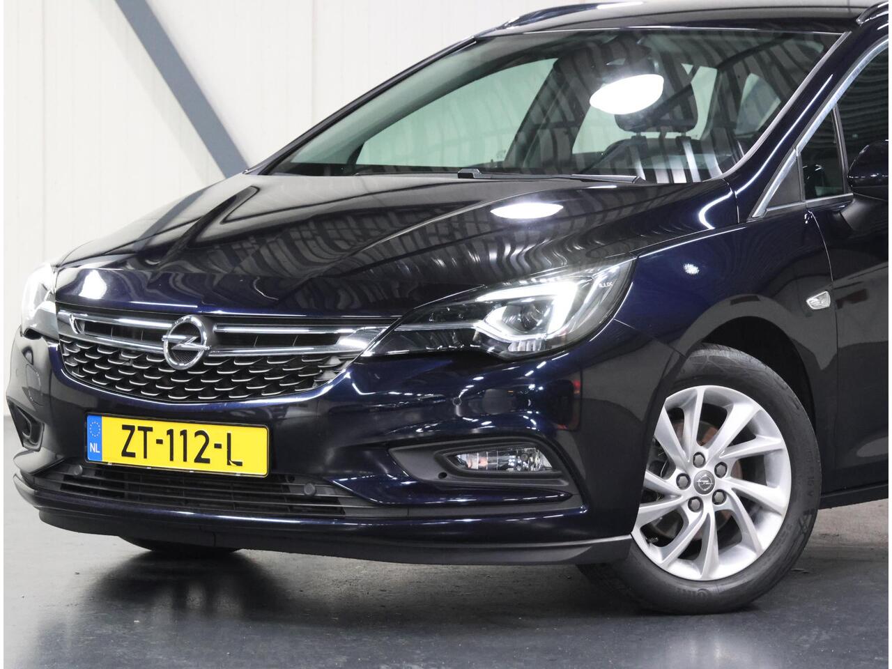 Opel ASTRA ST 150PK Innovation | 1ste eigenaar | AppleCarplay/Android Auto | AGR Stoelen | Elektrische klep | matrix LED lampen | Adaptive Cruise Control | Armsteun | Parkeersensoren | Navigatie | Climate Control | Keyless | AUTOMAAT | Isofix | Privacy Glass |