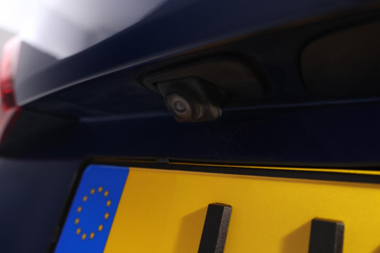 Opel ASTRA Sports Tourer 1.5 CDTI Elegance Navigatie, schuifdak, Halfleder, Trekhaak, Climate,