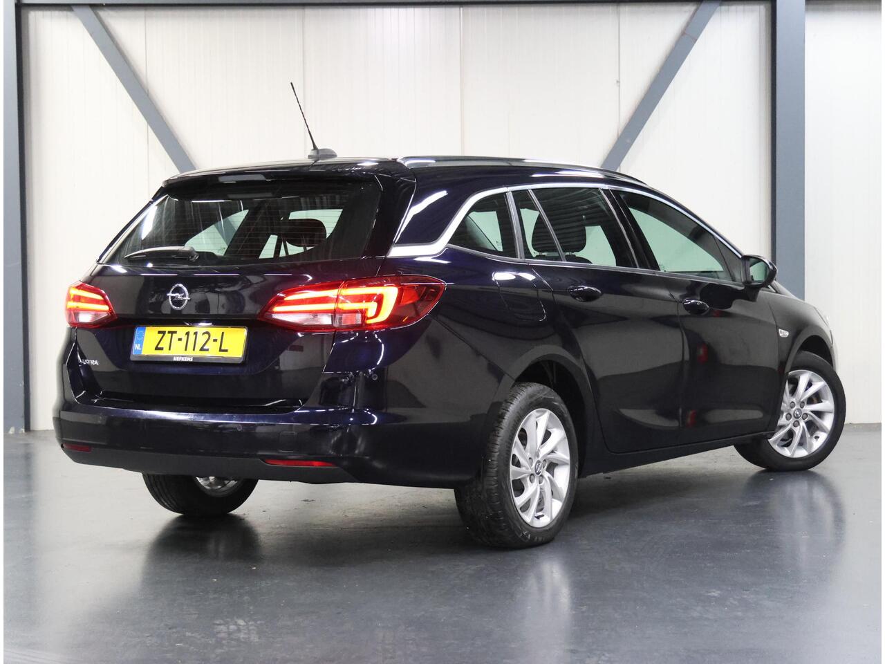 Opel ASTRA ST 150PK Innovation | 1ste eigenaar | AppleCarplay/Android Auto | AGR Stoelen | Elektrische klep | matrix LED lampen | Adaptive Cruise Control | Armsteun | Parkeersensoren | Navigatie | Climate Control | Keyless | AUTOMAAT | Isofix | Privacy Glass |