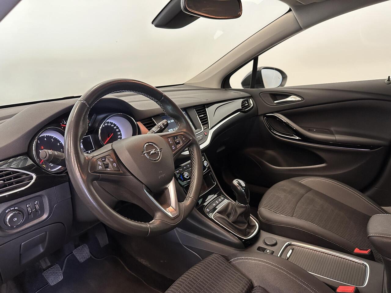 Opel ASTRA Sports Tourer 1.2 Design & Tech | Full LED | Climate Control | Navigatie | Apple Carplay/Android Auto | PDC V+A | Camera | Cruise Control | AGR Comfortstoel | Lane Assist | Privacy Glass | Gloss Black Pack