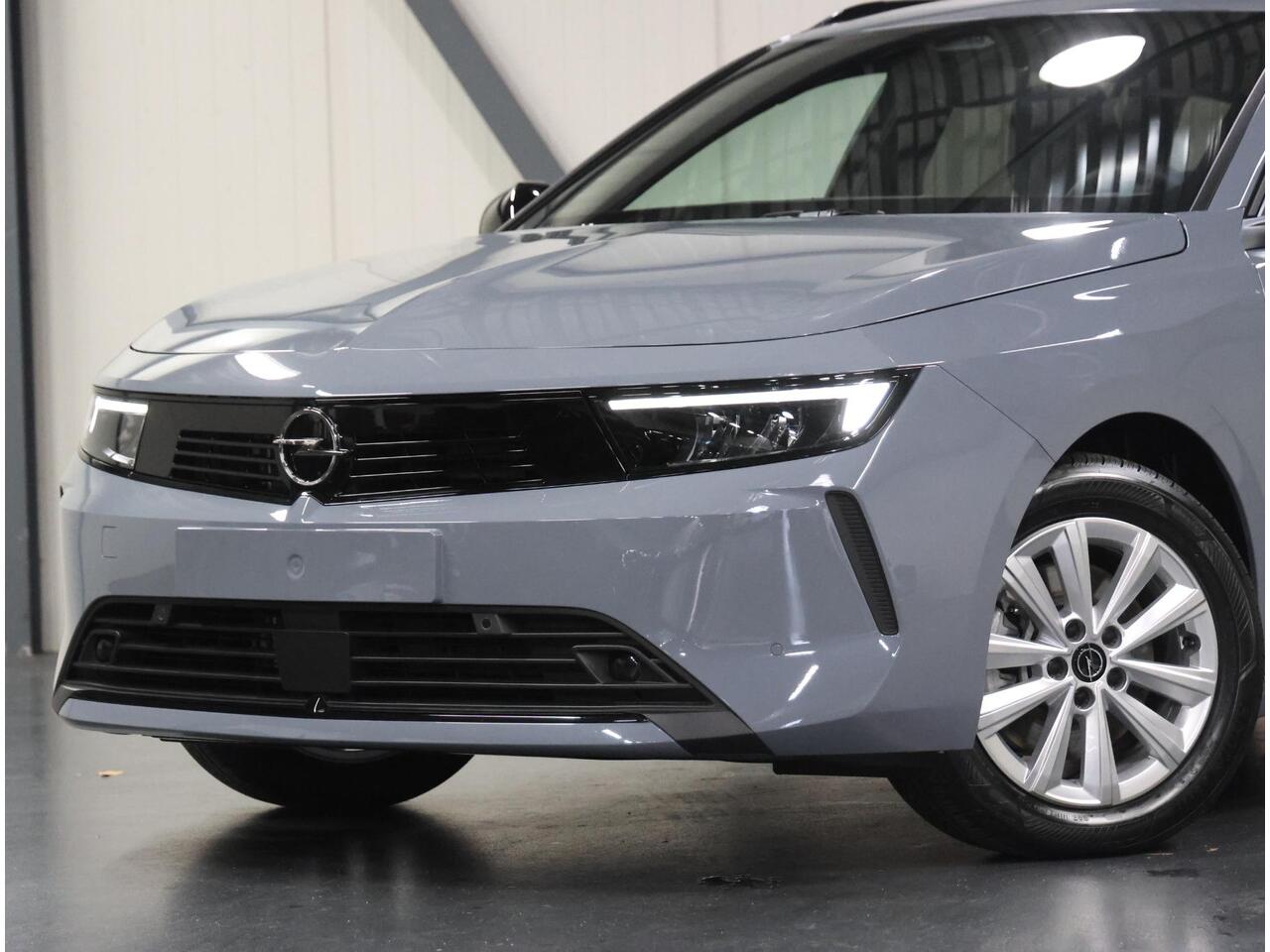 Opel ASTRA Sports Tourer 1.2 Turbo Hybrid Business Edition | AUTOMAAT | AppleCarplay/AndroidAuto | Navigatie | CruiseControl | Camera | Parkeersensoren | AGR Stoel | Stoel/Stuur verwarming |