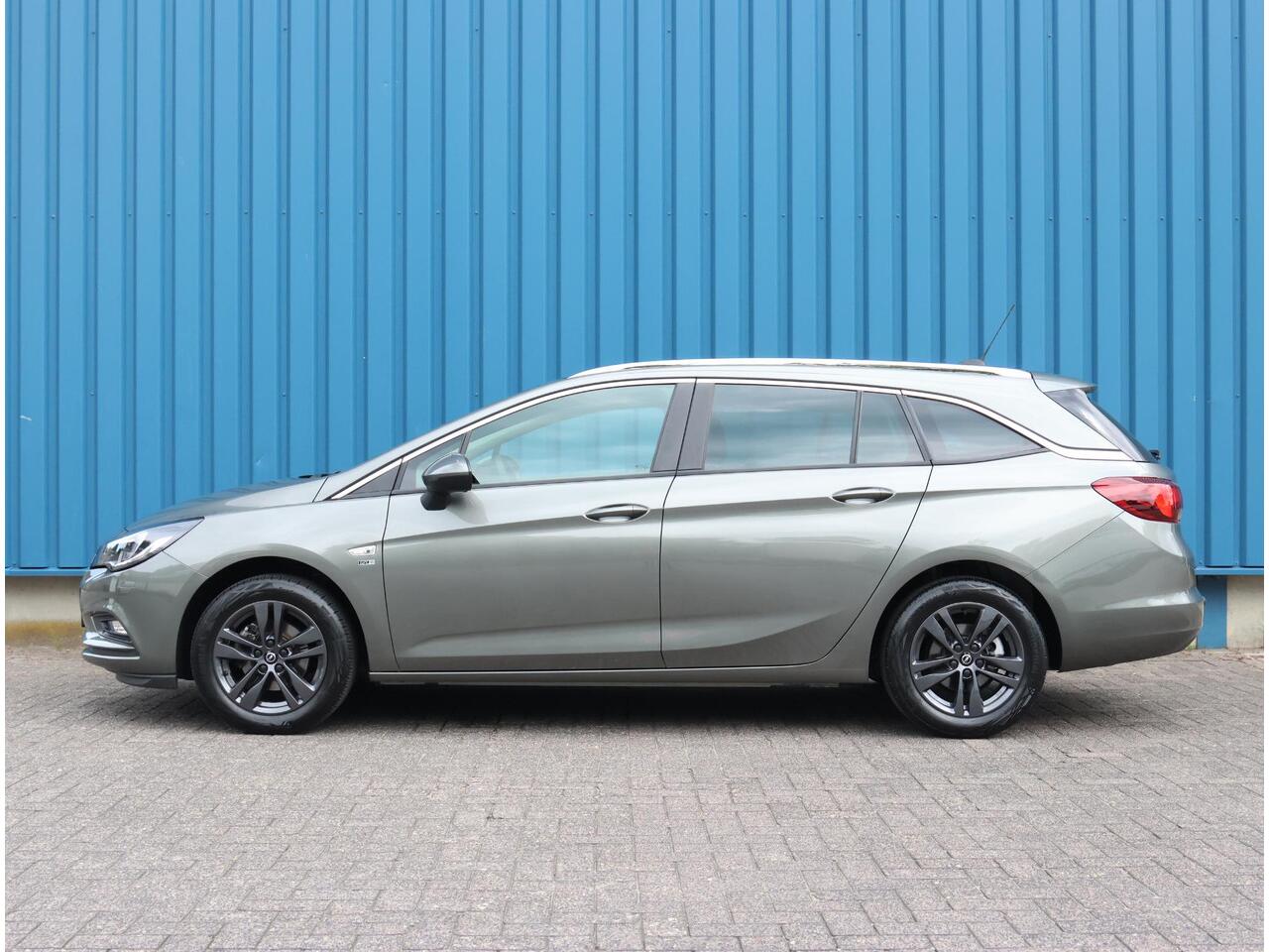 Opel ASTRA Sports Tourer 1.4 150PK Turbo 120 Jaar Edition | AppleCarPlay/AndroidAuto | Climate Control | Navigatie | Armsteun | Cruise Control | Trekhaak | Parkeersensoren | Privacy Glass | Isofix |