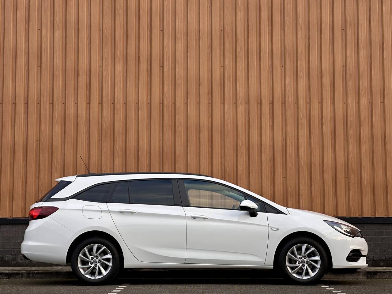 Opel ASTRA Sports Tourer 1.2 Edition | Cruise Control | Parkeersensoren Achter | Apple Carplay/Android Auto | DAB | Navigatie |