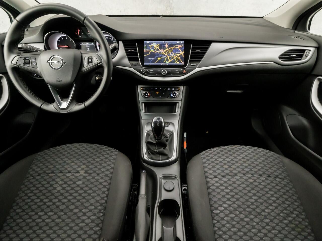 Opel ASTRA Sports Tourer 1.0 Turbo Sport (APPLE CARPLAY, GROOT NAVI, CLIMATE, SPORTSTOELEN, CRUISE, PARKEERSENSOREN, GETINT GLAS, LM VELGEN, NIEUWSTAAT)