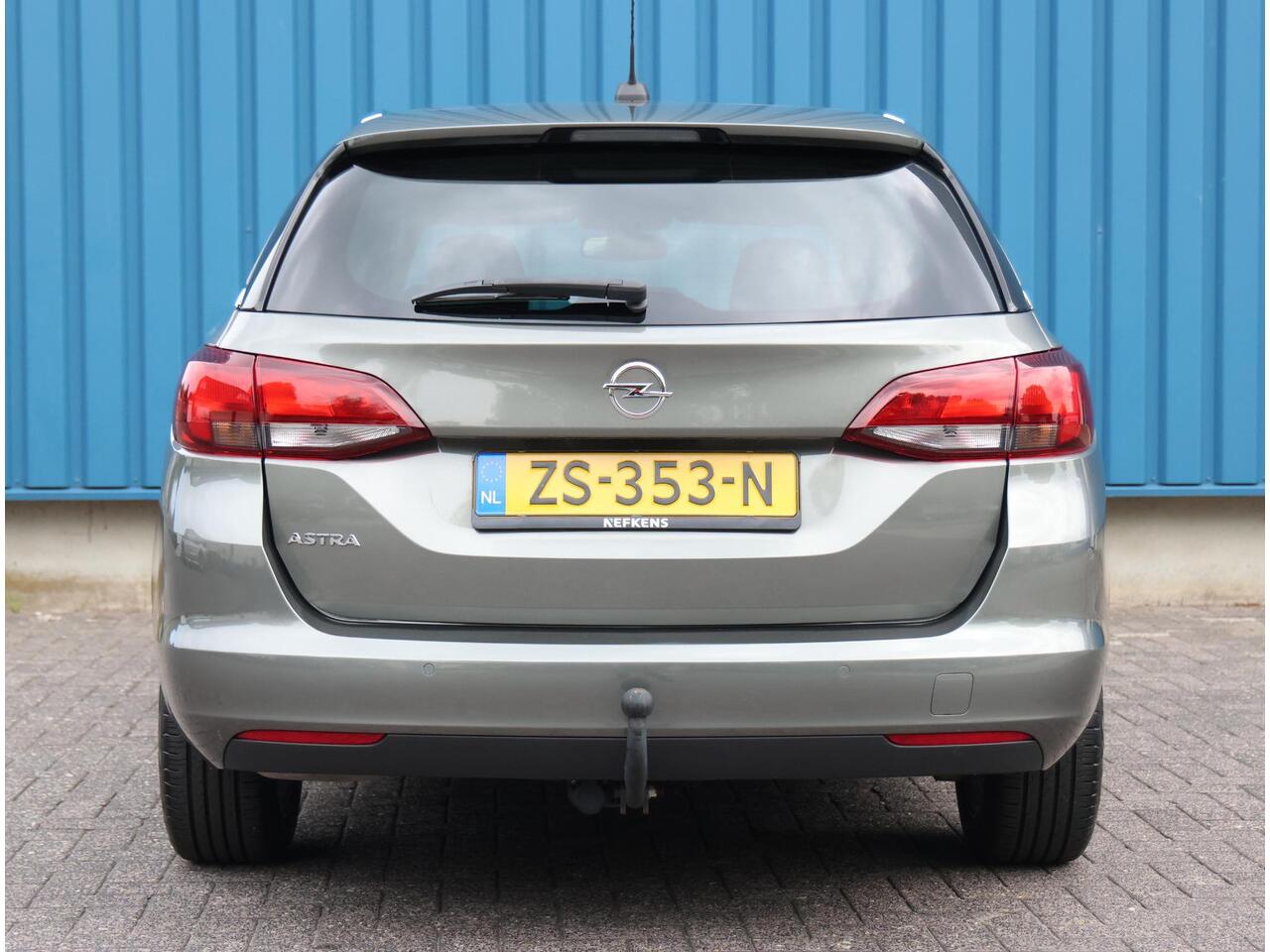 Opel ASTRA Sports Tourer 1.4 150PK Turbo 120 Jaar Edition | AppleCarPlay/AndroidAuto | Climate Control | Navigatie | Armsteun | Cruise Control | Trekhaak | Parkeersensoren | Privacy Glass | Isofix |
