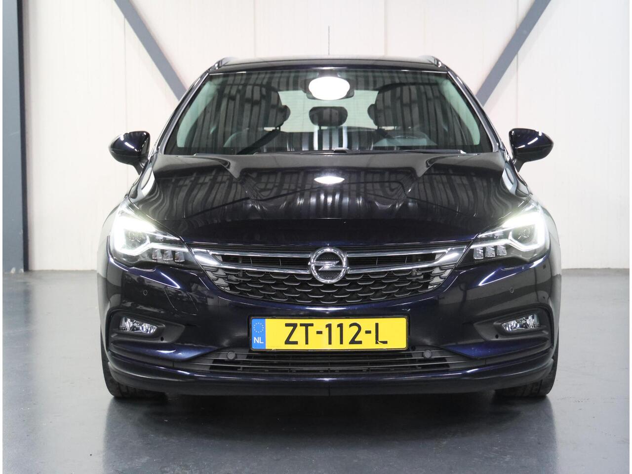 Opel ASTRA ST 150PK Innovation | 1ste eigenaar | AppleCarplay/Android Auto | AGR Stoelen | Elektrische klep | matrix LED lampen | Adaptive Cruise Control | Armsteun | Parkeersensoren | Navigatie | Climate Control | Keyless | AUTOMAAT | Isofix | Privacy Glass |