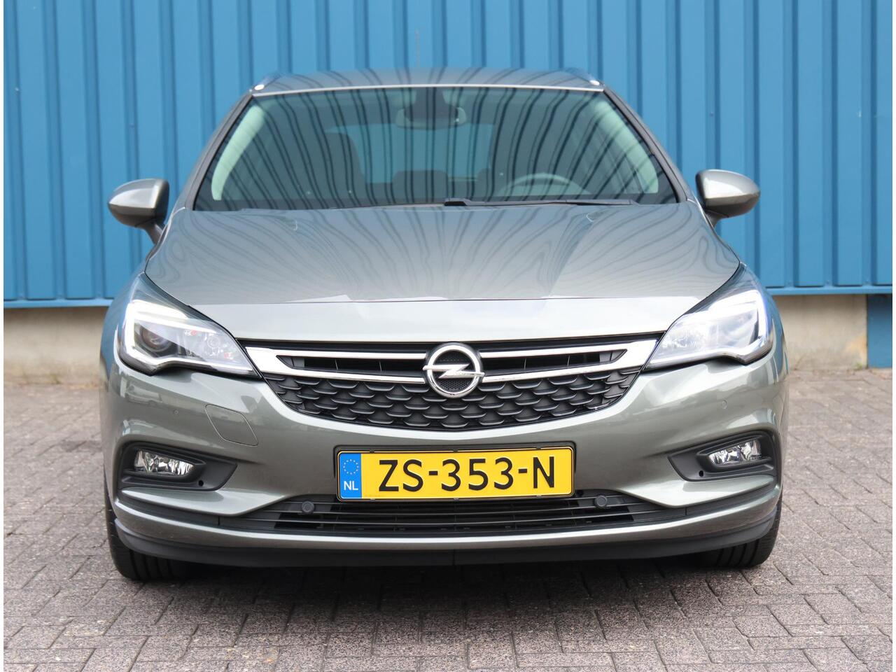 Opel ASTRA Sports Tourer 1.4 150PK Turbo 120 Jaar Edition | AppleCarPlay/AndroidAuto | Climate Control | Navigatie | Armsteun | Cruise Control | Trekhaak | Parkeersensoren | Privacy Glass | Isofix |