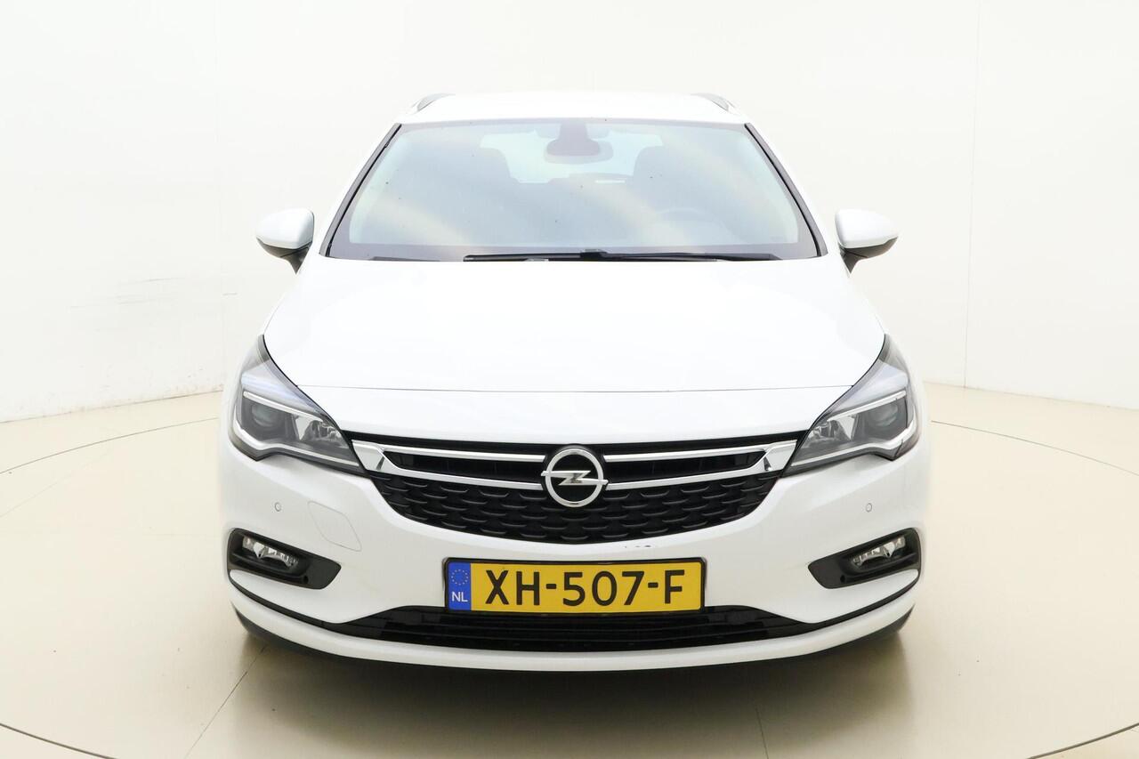 Opel ASTRA Sports Tourer 1.0 Turbo 105pk Online Edition | Navigatie | Climate control | Getint glas | Cruise control | Bluetooth | Parkeersensoren | Dakrails | DAB Radio