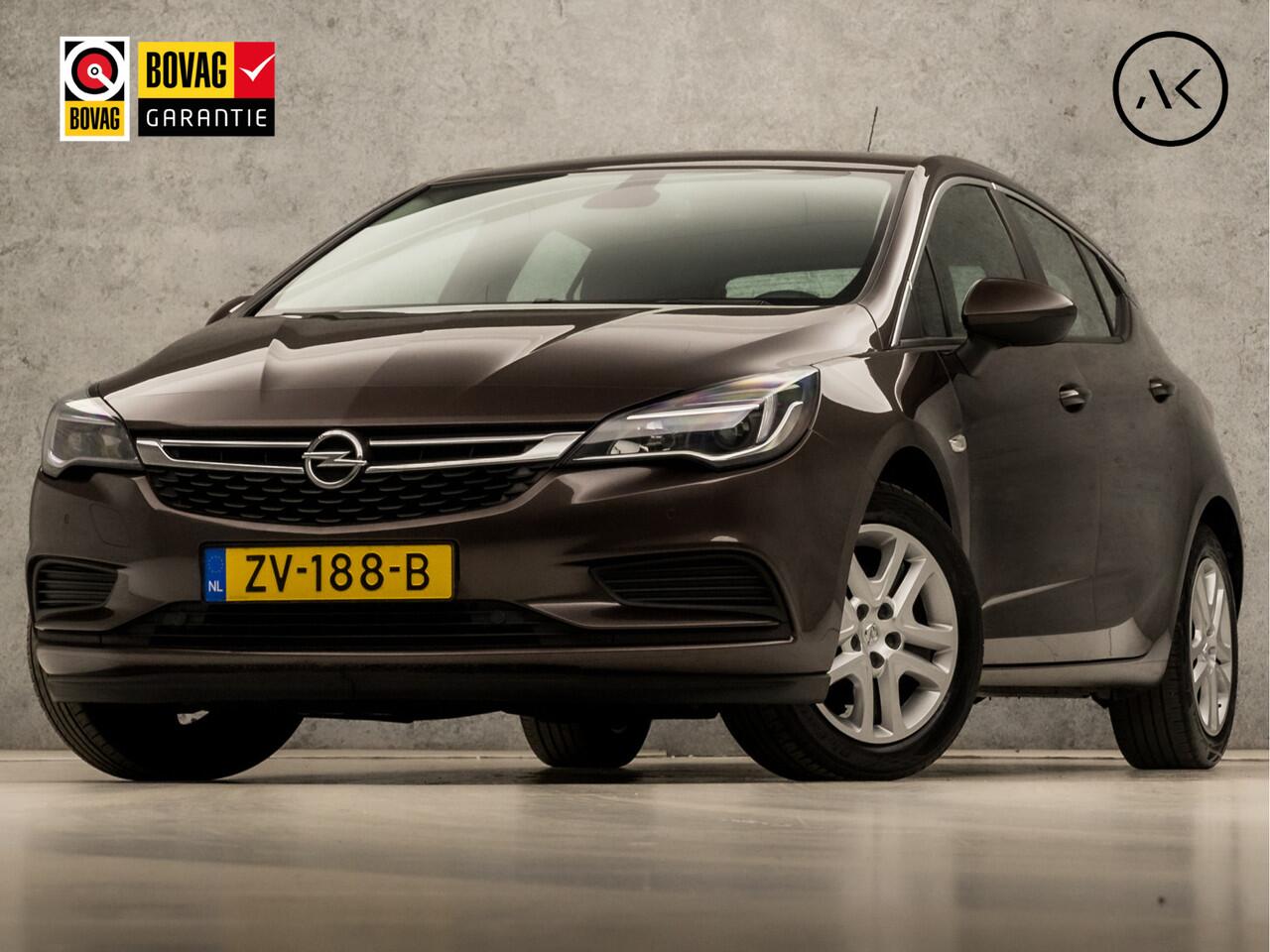 Opel ASTRA 1.4 Turbo Sport 150Pk Automaat (APPLE CARPLAY, GROOT NAVI, CLIMATE, LM VELGEN, SPORTSTOELEN, TREKHAAK, PARKEERSENSOREN, NIEUWE APK, NIEUWSTAAT)