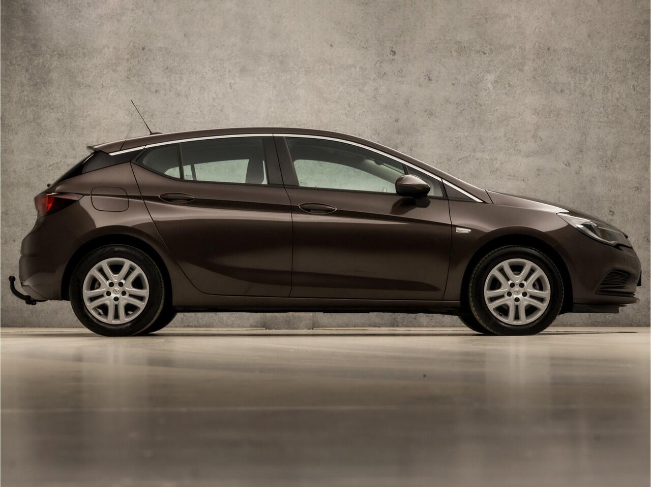 Opel ASTRA 1.4 Turbo Sport 150Pk Automaat (APPLE CARPLAY, GROOT NAVI, CLIMATE, LM VELGEN, SPORTSTOELEN, TREKHAAK, PARKEERSENSOREN, NIEUWE APK, NIEUWSTAAT)