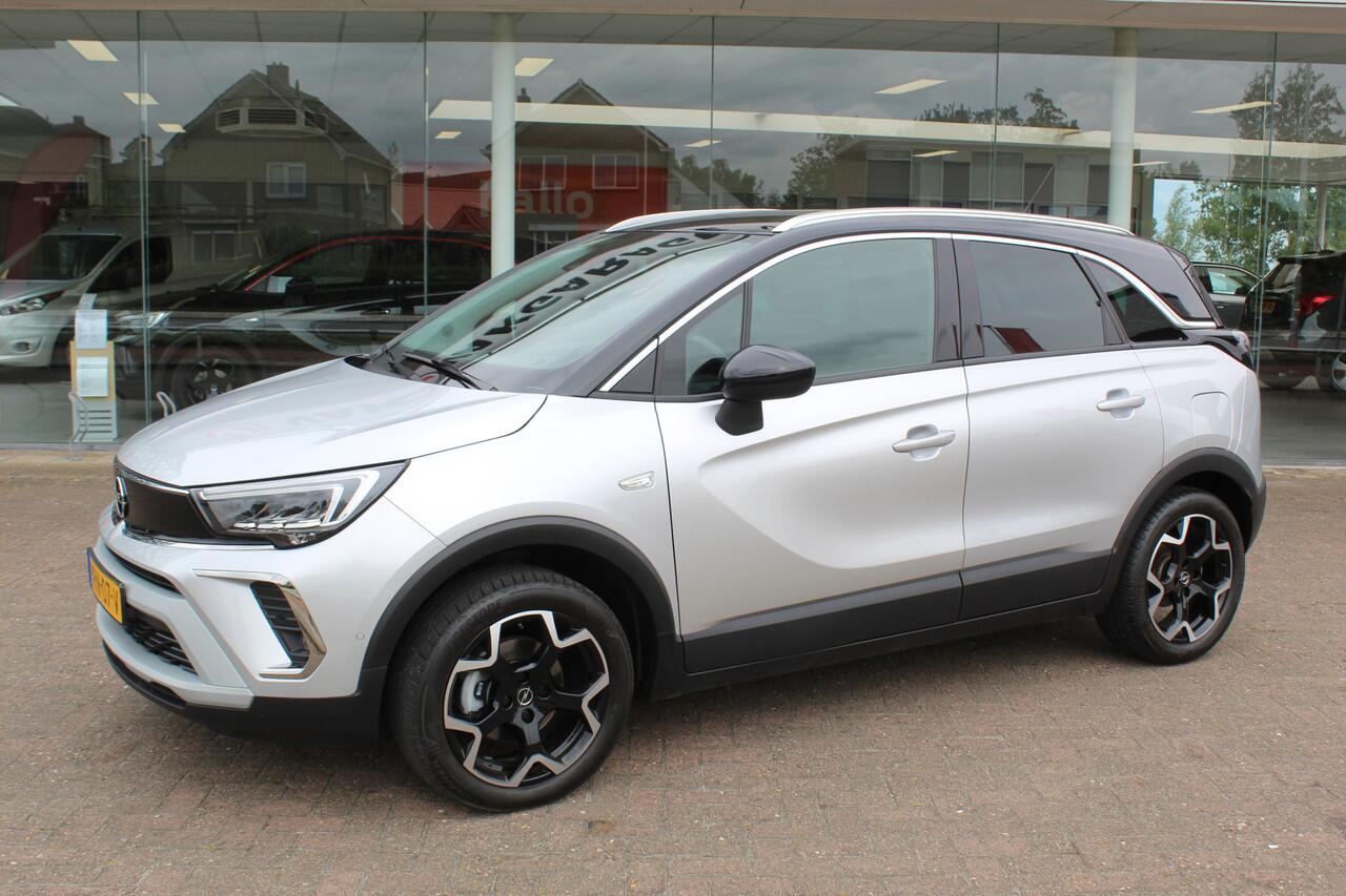 Opel Crossland 1.2-110pk Turbo 'Elegance'. Mooie en luxe hoogzitter met weinig km's ! Volautm. airco dual, cruise control, camera, comfortstoelen, metallic lak, LM wielen, navigatie, telefoonvoorb., lane- en side assist, parkeersensoren v+a, LED verlichting etc.
