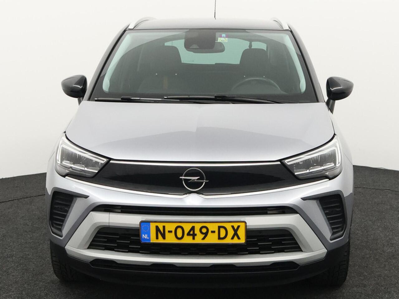 Opel Crossland 1.2 Turbo Elegance Airco, Apple Carplay/Android Auto, bluetooth, Bandenspanningscontrolesysteem, Achteruitrijcamera, Rijstrooksensor, regensensor, Op zoek naar een compacte SUV die stijl, comfort en zuinigheid perfect combineert? Dan is deze Opel Crosslan