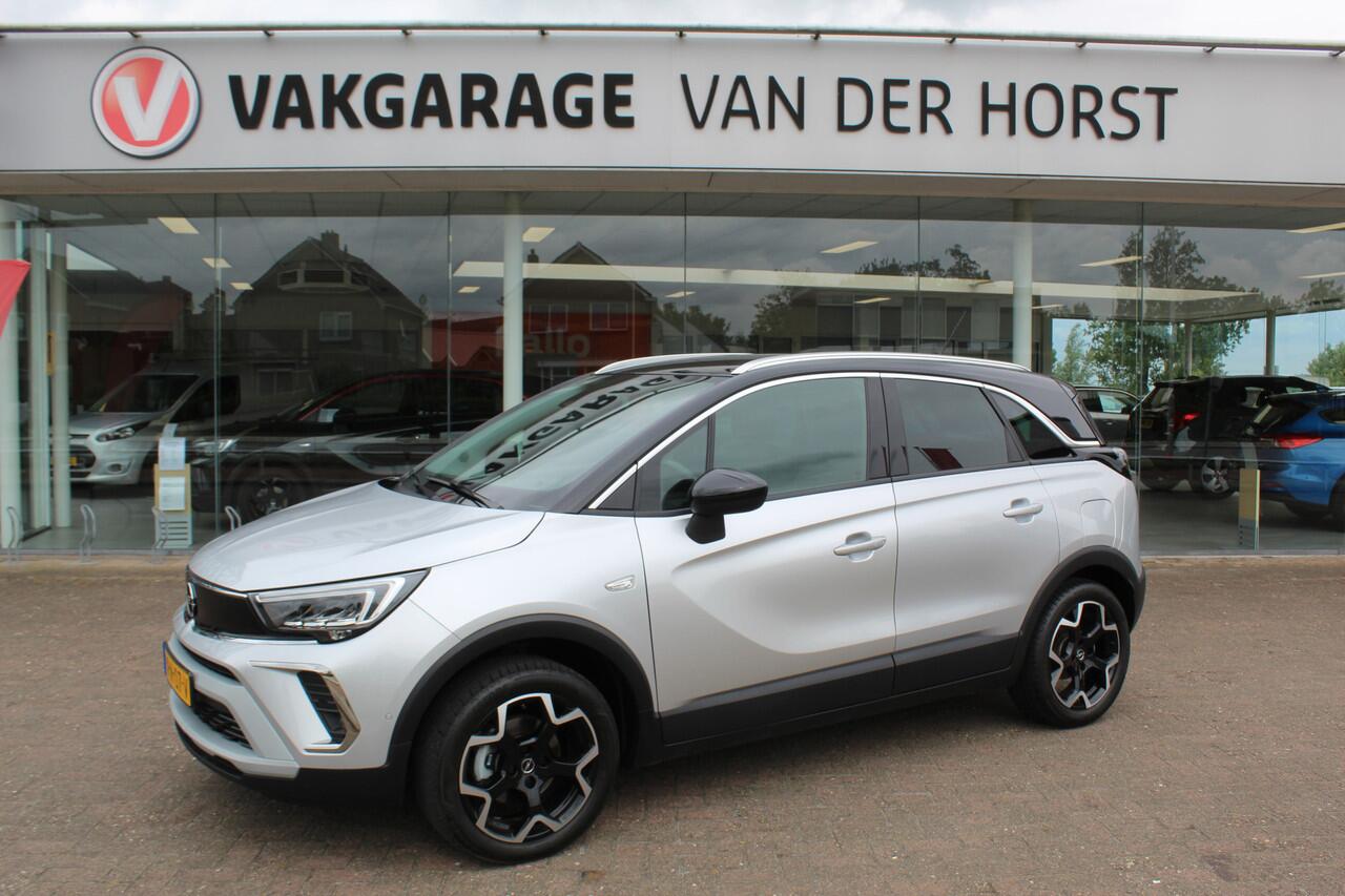 Opel Crossland 1.2-110pk Turbo 'Elegance'. Mooie en luxe hoogzitter met weinig km's ! Volautm. airco dual, cruise control, camera, comfortstoelen, metallic lak, LM wielen, navigatie, telefoonvoorb., lane- en side assist, parkeersensoren v+a, LED verlichting etc.