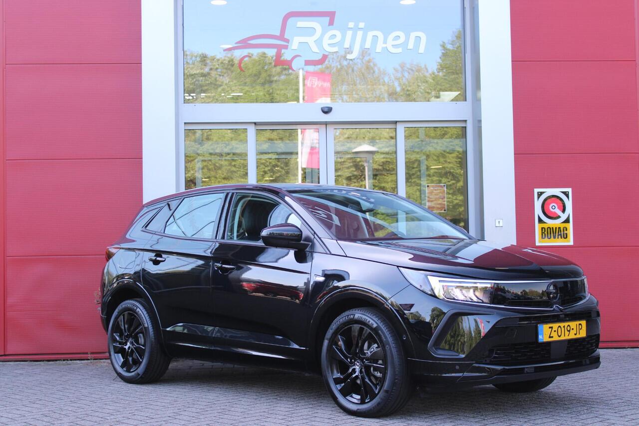 Opel Grandland 1.2 Turbo 145PK AUTOMAAT Hybrid GS | BLACK PACK | STOEL/STUUR VERWARMING | NAVIGATIE | APPLE CARPLAY/ANDROID AUTO | DODEHOEK DETECTIE | 18" LICHTMETALEN VELGEN | DAB+ RADIO | PARKEERSENSOREN VOOR + ACHTER | ADAPTIVE CRUISE CONTROL | ACHTERUITRIJ CAMERA |