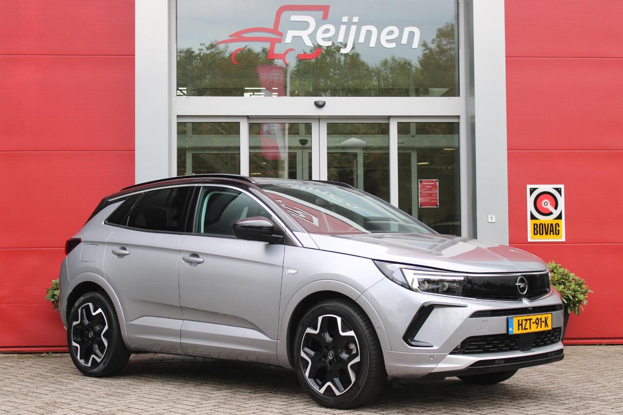 Opel Grandland 1.2 Turbo 130PK AUTOMAAT ULTIMATE | STOEL/STUUR/VOORRUIT VERWARMING | ACHTRERUITRIJ CAMERA | DODEHOEK DETECTIE | ELEKTRISCH BEDIENBARE ACHTERKLEP | FULL LED MATRIX KOPLAMPEN | NAVIGATIE | 19" LICHTMETALEN VELGEN | ALCANTARA BEKLEDING | APPLE CARPLAY/ANDRO
