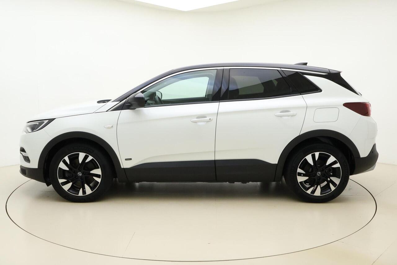 Opel Grandland X 1.6 Turbo 300pk Hybrid4 Elegance | Navigatie | Keyless | Camera | Parelmoer kleur | Electrische achterklep | Lichtmetalen velgen | AGR Comfortstoelen | Voorruitverwarming | Zwart dak