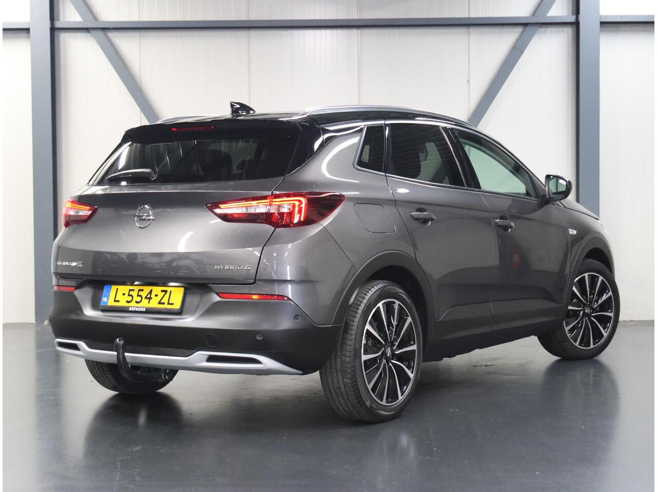 Opel Grandland X 300PK Hybrid4 Ultimate | AppleCarPlay/AndroidAuto | Navigatie | Adaptive Cruise Control | Keyless | LEER | Stoelkoeling/Stoel/Voorruitverwarming | FULL LED | 360'Camera | Trekhaak | Two-tone | Isofix | Privacy Glass |