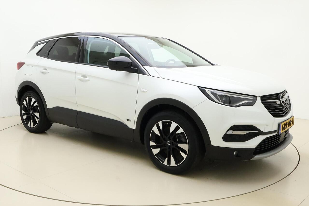 Opel Grandland X 1.6 Turbo 300pk Hybrid4 Elegance | Navigatie | Keyless | Camera | Parelmoer kleur | Electrische achterklep | Lichtmetalen velgen | AGR Comfortstoelen | Voorruitverwarming | Zwart dak
