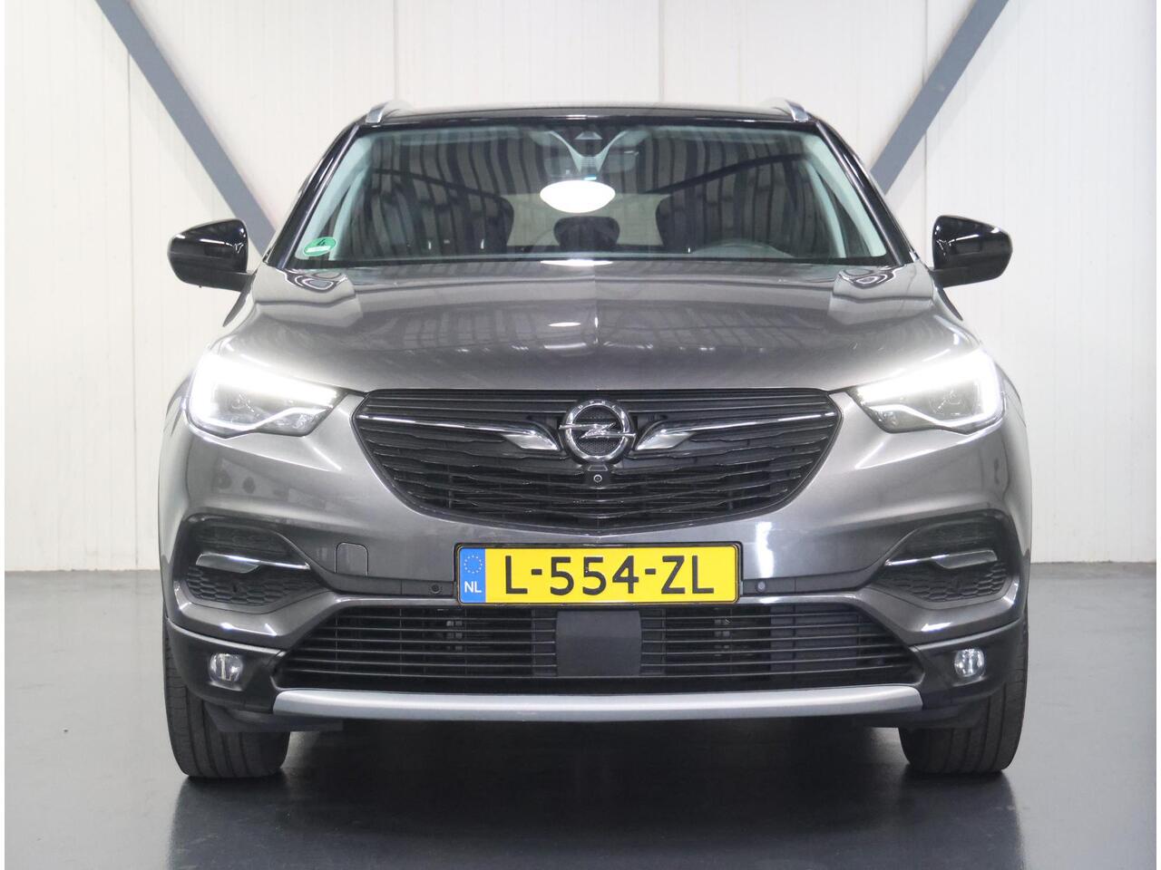 Opel Grandland X 300PK Hybrid4 Ultimate | AppleCarPlay/AndroidAuto | Navigatie | Adaptive Cruise Control | Keyless | LEER | Stoelkoeling/Stoel/Voorruitverwarming | FULL LED | 360'Camera | Trekhaak | Two-tone | Isofix | Privacy Glass |