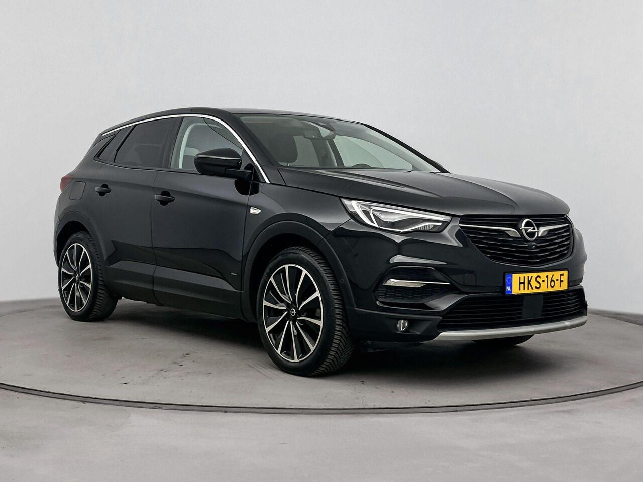 Opel Grandland X 1.6 Turbo Hybrid4 Elegance | PHEV 300 PK | Comfortstoelen | Trekhaak | Navigatie | Camera | All Season banden | Parkeersensoren |