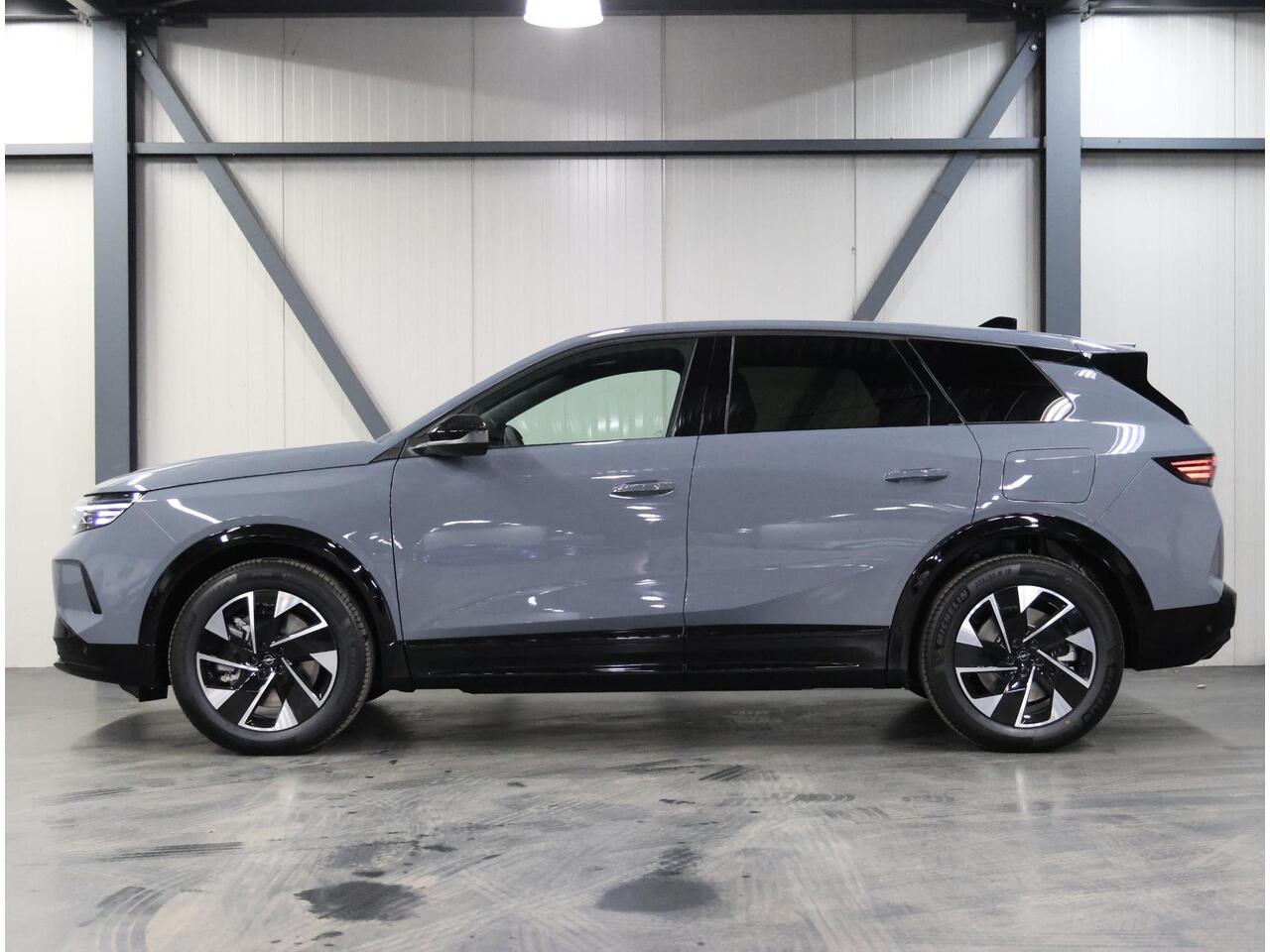 Opel Grandland Electric Business Edition 73 kWh | Incl. ¤1.897,08 Korting! | 17% bijtelling | AUTOMAAT | Warmtepomp | 360° Camera | Stoel, stuur & voorruit verwarmd | Apple Carplay/Android Auto | Elektr. achterklep | ARG-stoelen | Matrix LED | Navigatie |