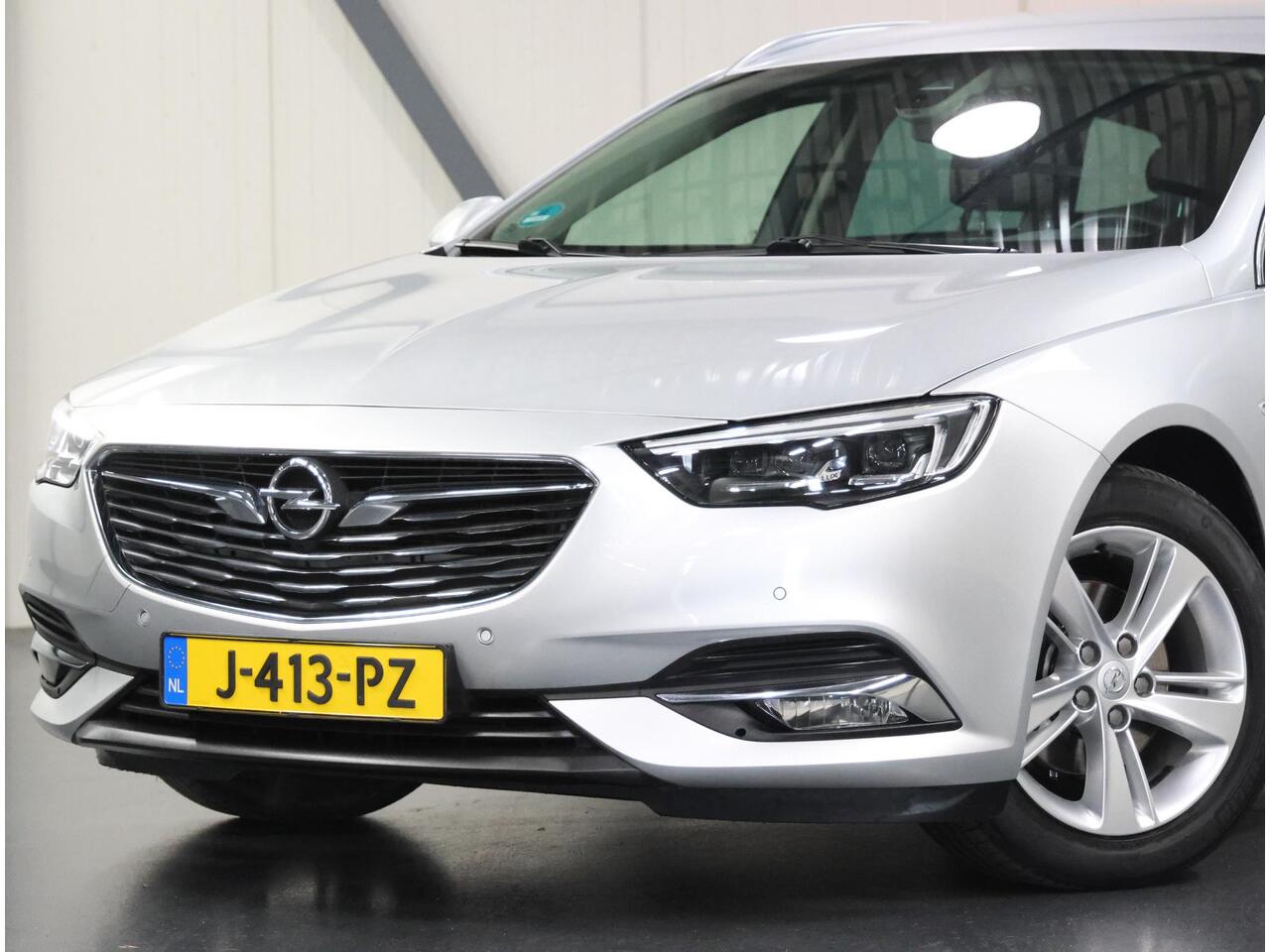 Opel INSIGNIA ST 165PK Turbo Innovation | 1ste eigenaar | AppleCarplay/AndroidAuto | Climate Control | Adaptive Cruise Control | Camera | AGR stoelen | Electrische achterklep | matrix LED | AUTOMAAT | Parkeersensoren | Privacy Glass | Isofix |