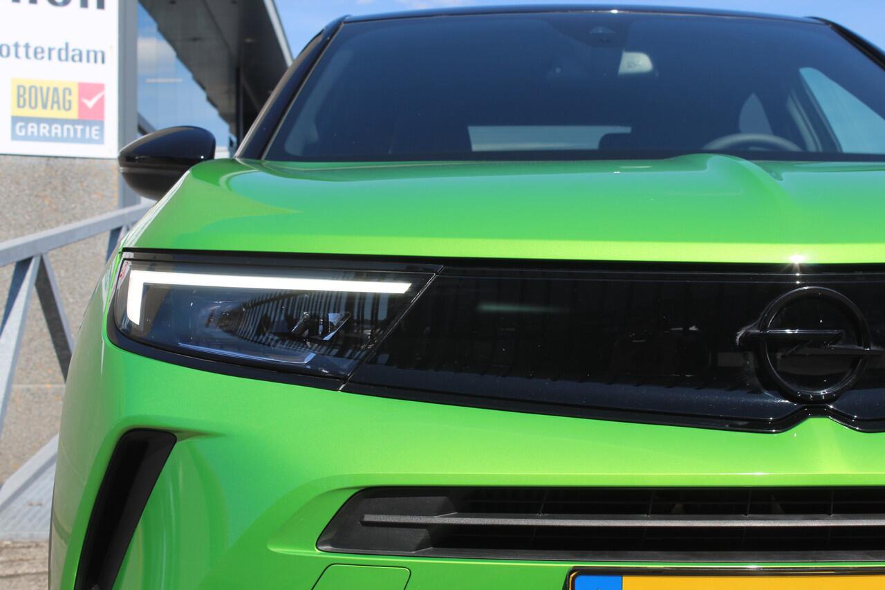 Opel MOKKA 1.2 Turbo Ultimate Automaat Navigatie/Virtual cockpit/Adaptive cruise control/Achteruitrijcamera/Parkeersensoren rondom/Apple carplay/Dodehoek detectie/Stoelverwarming/Stuurverwarming/Climate control/DAB/Lane assist/18'' Lichtmetalen velgen.