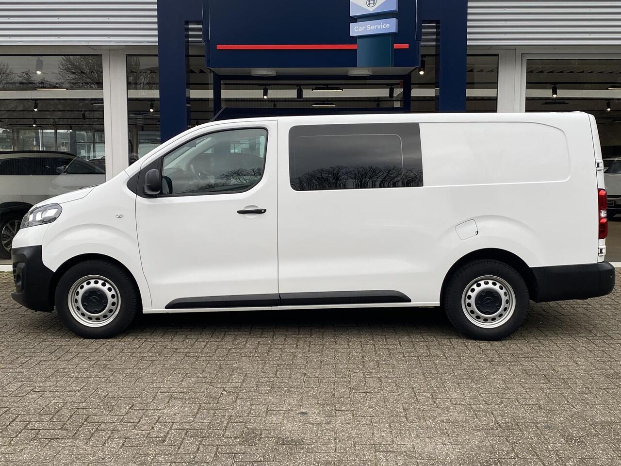 Opel VIVARO 1.5 CDTI L3H1 DC Selection / 6-Persoons / Cruise-Control / Trekhaak / Zijschuifdeur-Rechts / Houten-Vloer / Zijwandbekleding / Apple-Carplay & Android-Auto / Navi / Radio-Bluetooth / Airco / 16'' All-Seasons / ENZ.