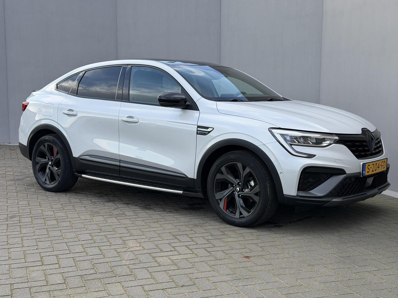 Renault Arkana 1.6 E-Tech Hybrid 145 R.S. Line / Trekhaak (760KG) / Dealer Onderhouden / Adaptive Cruise Control / Camera / Lederen Bekleding / Stoel-/Stuurwiel Verwarming / Spoiler / Zwart Dak / DAB /